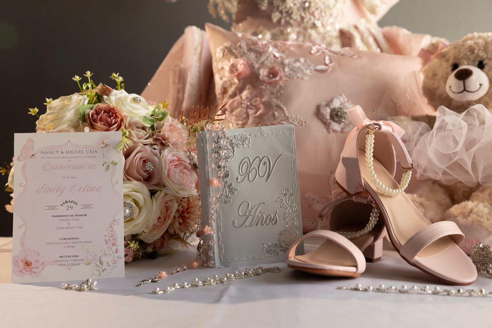 The invitation, satin heels and a teddy bear dressed for the day