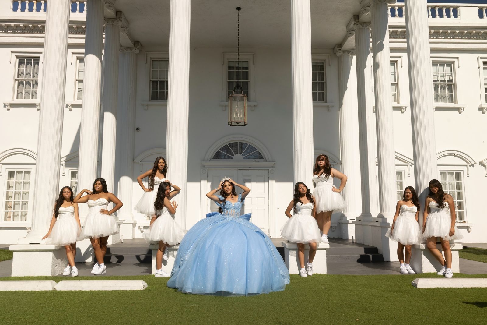 The court on the lawn of a white-columned venue